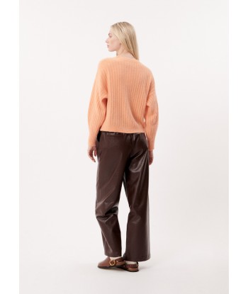 ELENE ORANGE Cardigan s'inspire de l'anatomie humaine